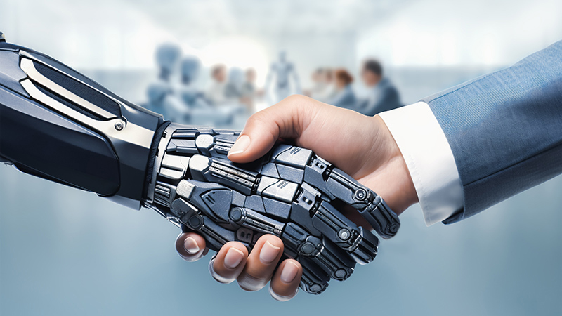 IA acuerdo: se dan la mano un robot y un humano